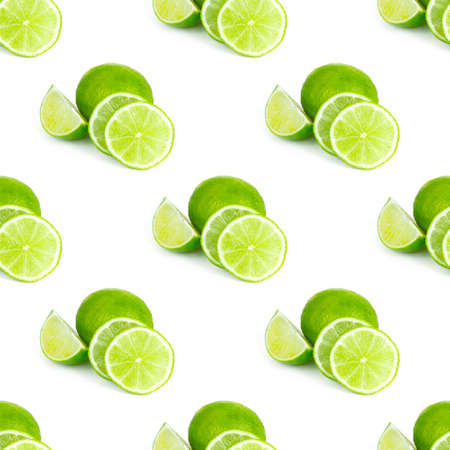 Green limes and lime slices repeat seamless pattern on white background.の写真素材