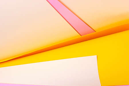 Abstract geometric light pink and yellow shades blank paper background. Textured canvas element for text design, greeting card, template with copy spaceの写真素材