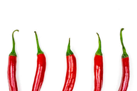Top view of fresh red hot chili pepper flat lay set collection on a white background.の写真素材