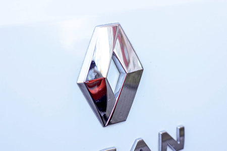MINSK, BELARUS - APRIL 14, 2022: Renault car logo sign in front of a brand automobile.