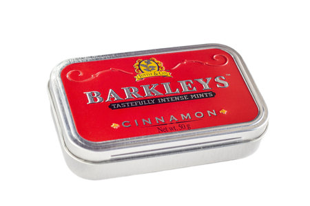 DUSHANBE, TAJIKISTAN - AUGUST 26, 2022: Barkleys tastefully intense mints with cinnamon flavour metal package box isolated on white background.のeditorial素材