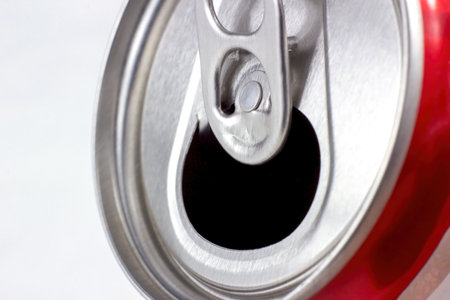 Opened metal aluminum can with soda drink close up on light background with copy space.の写真素材