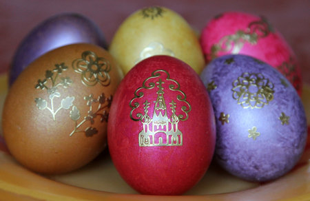 close-up colorful easter eggs on a plate
