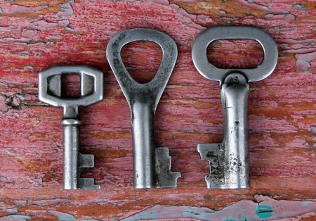 Three old rusty keys