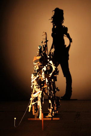 MOSCOW, RUSSIA - AUG 19, 2014: Artwork of Tim Noble and Sui Webster, "The Individual". Beam of light directed on the installation at a certain angle, makes visible the hidden silhouette of a womanのeditorial素材