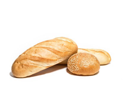 Different kinds of wheat ar corn bread isolated on whiteの写真素材