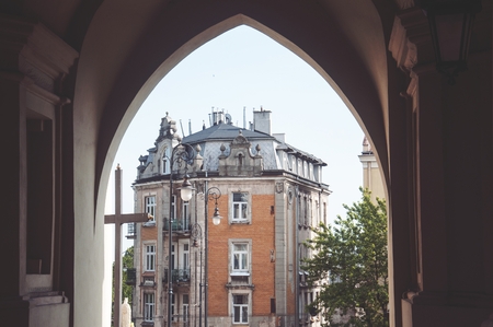 view of a beautiful antique tenement from under the towerのeditorial素材