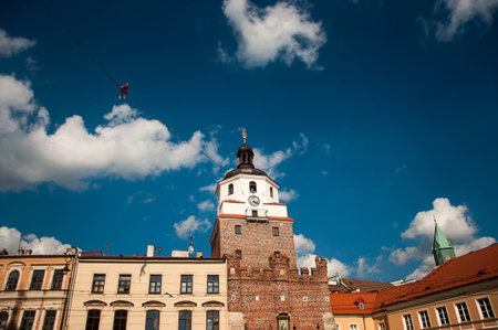 LUBLIN, POLAND - July 29, 2017 - slackliner in old town at the Urban Highline Festival in Lublin,...
