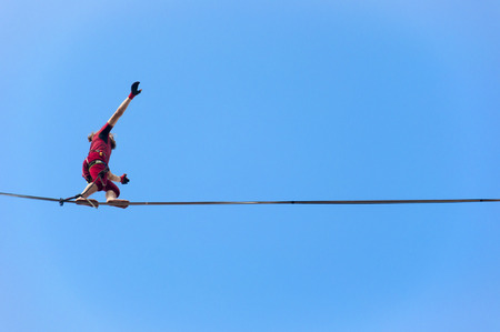LUBLIN, POLAND- 29 july 2017- slackliner in old town at Urban Highline Festival placed in city space of Lublin - biggest slacklining spectacle in the worldのeditorial素材