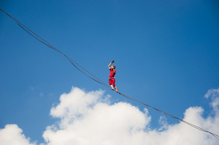 LUBLIN, POLAND- 29 july 2017- slackliner in old town at Urban Highline Festival placed in city space of Lublin - biggest slacklining spectacle in the worldのeditorial素材