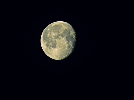 Beautiful Full Moon observed during Night on a Black Skyの写真素材