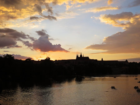 A Beautiful Panorama of Prague Old Historical Castle During Sunset, Hradcany, Czech Republicの写真素材