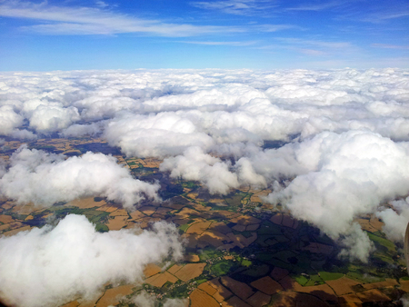 Aerial view of clouds and village landscapeの写真素材