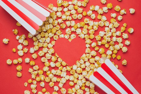 Like heart and popcorn on a red background top viewの写真素材