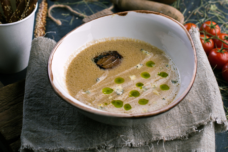 Vegetable soup with blue cheese and breadsticksの写真素材