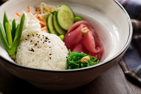 Asian food: rice with sesame and tuna in a restaurant macroの写真素材