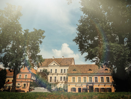 The main street of the city of Minsk , Belorus on a sunny day. Summer day landscape side viewのeditorial素材