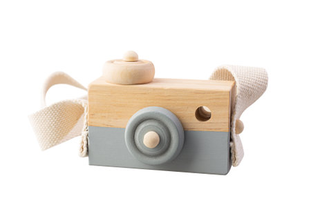 Wooden camera toy isolated on white background. Made from jackfruit wood side viewの写真素材