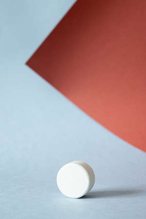 Geometric shape on a blue background, for the presentation of products, abstract geometric background with a pedestalの写真素材