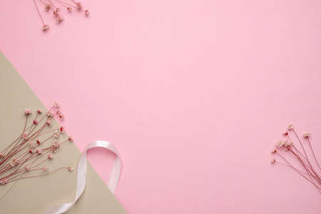 Pink pastel background with dried flowers. Natural colors, trend concept . High quality photoの写真素材