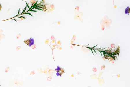 Limonium flowers and green rosemary table texture made of epoxy resin close-upの写真素材