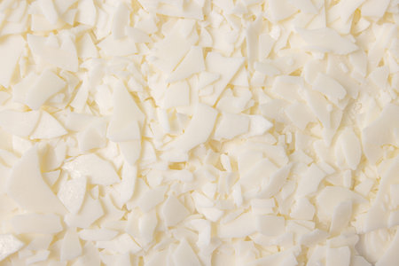 Soy wax for home-made natural white eco-friendly soy candles. Idea for a hobby, business. Making...