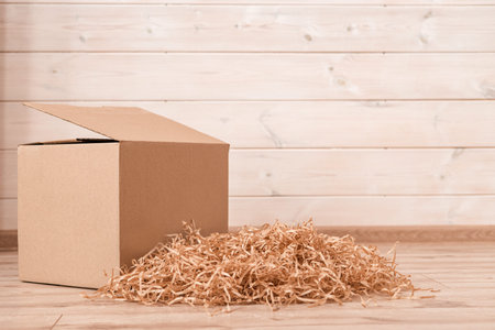 Moving day, box with paper material.Eco material for packaging goods, things, fragile items....