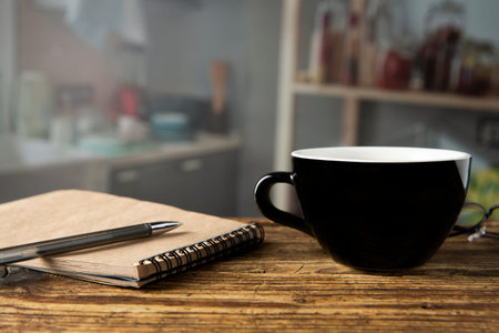 Retro set for concept design, black cup mock up with craft notebook on wooden background . Business, father day concept.の写真素材