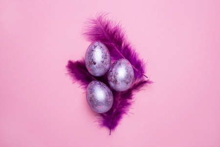 Easter eggs purple on pink background. Purple background. Easter eggs, rabbit. Traditional ornament. Spring season.の写真素材