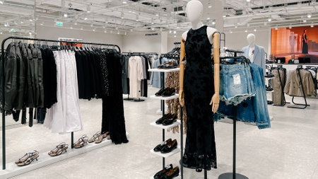 Moscow,Russia 03 14 2024 Clothes magazine shop in Paveletskaya plaza station , man and women modern clothes mannequin shoppingのeditorial素材