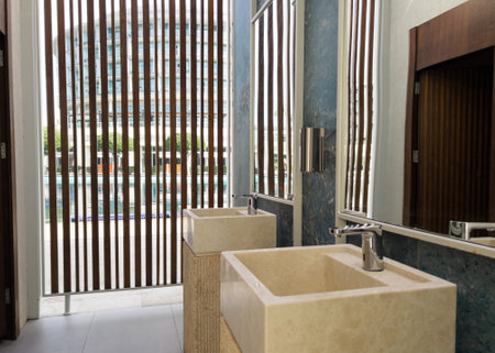Wash stone basins at the hotel spa resort outside by swimming poolの写真素材