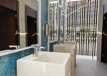 Wash stone basins at the hotel spa resort outside by swimming poolの写真素材