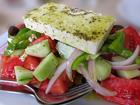 Delicious Greek salad with feta and olives. Delicious Greek cuisineの写真素材