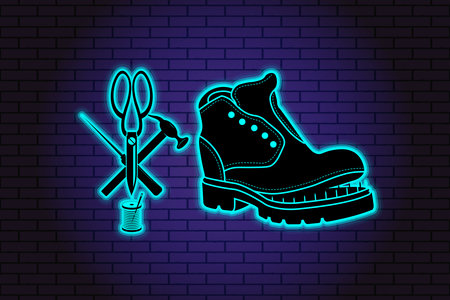 Shoe repair service and maintenance. Vector image . Neon symbol in old retro style. On background of brick illuminated wall. Repair of women's, men's shoes. Boots and a set of tools silhouetteの写真素材