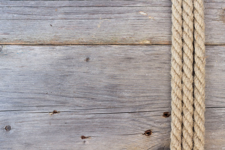 Rope on dark woodの写真素材