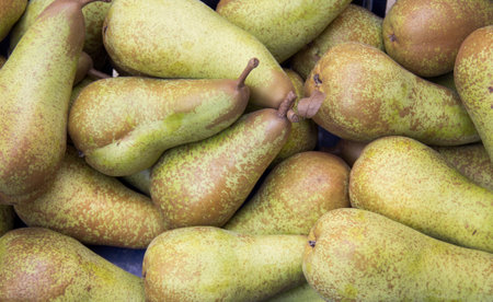 Green pears at a local farmers marketの写真素材