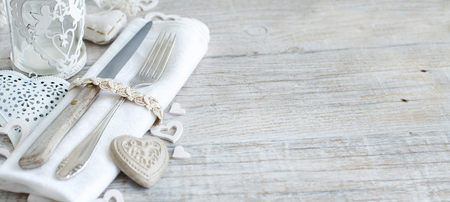 Valentine day rustic table setting on a wooden tableの写真素材