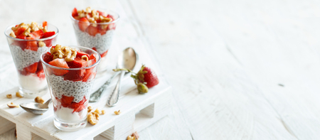 Chia pudding Strawberry parfait with greek yogurt and nutsの写真素材