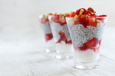 Chia pudding Strawberry parfait with greek yogurt and nutsの写真素材