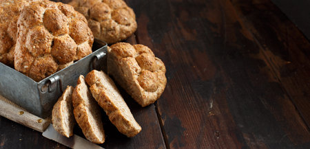 Whole wheat Bread on a Wooden Table close up