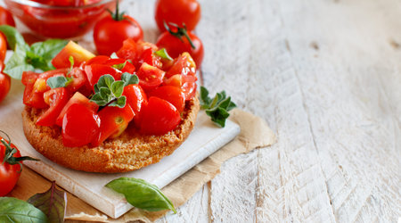 Frisella, typical south italian bread seasond with tomatoes and herbs