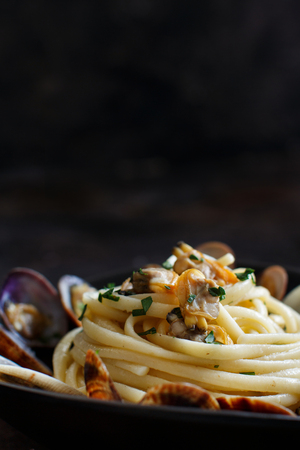Linguini with clams top view - Traditional italian seafood pastaの写真素材