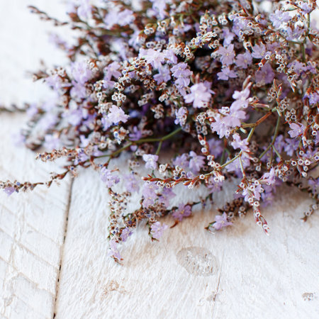 Spring background with flowers on a wooden background close upの写真素材