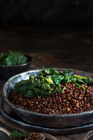 Black beluga lentils and spinach stew close upの写真素材