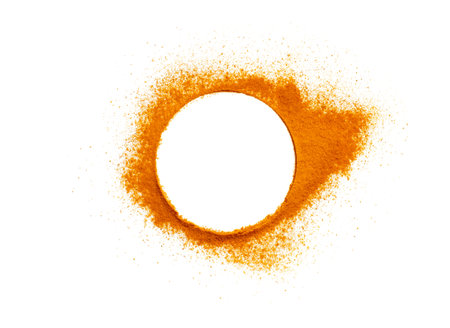 Turmeric powder on a white background top viewの写真素材