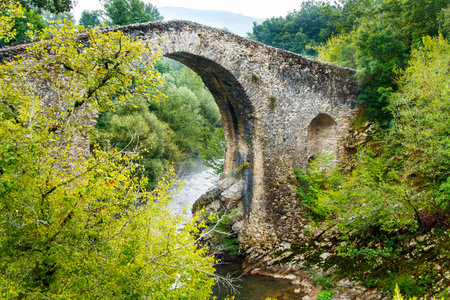 A medieval bridge on Calore River near Felitto in Cilento National Park, Campania, italyの写真素材
