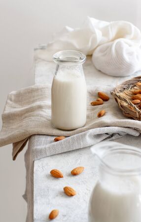 Vegan almond milk, non dairy alternative milk  in a bottle close upの写真素材