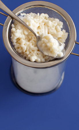 Preparation of fermented drink kefir close up