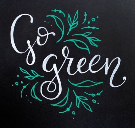 Chalkboard with Go Green lettering top viewの写真素材