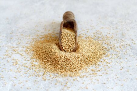 Scoop of raw Amaranth Grain  close upの写真素材